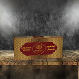 Majestic Perfumes India Bakhoor Honey, fragrant incense blocks with honey scent, used for traditional aromatic burning.