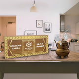 Majestic Perfumes India Bakhoor Zahra, fragrant incense bricks with intricate design and warm brown color.