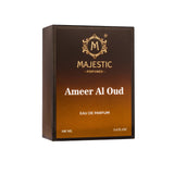 A 100ml bottle of Ameer Al Oud perfume by Majestic Perfumes India with ornate packaging and a dark amber-colored liquid inside.