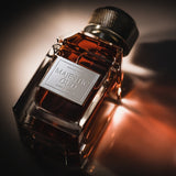 Majestic Oud 80ML Eau de Parfum by Majestic Perfumes India displayed in a sleek glass bottle with a black cap.