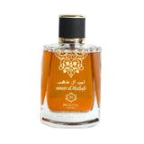 Ameer Al Dhahab perfume bottle by Majestic Perfumes India, 100ml, with intricate gold and black design on a plain background.