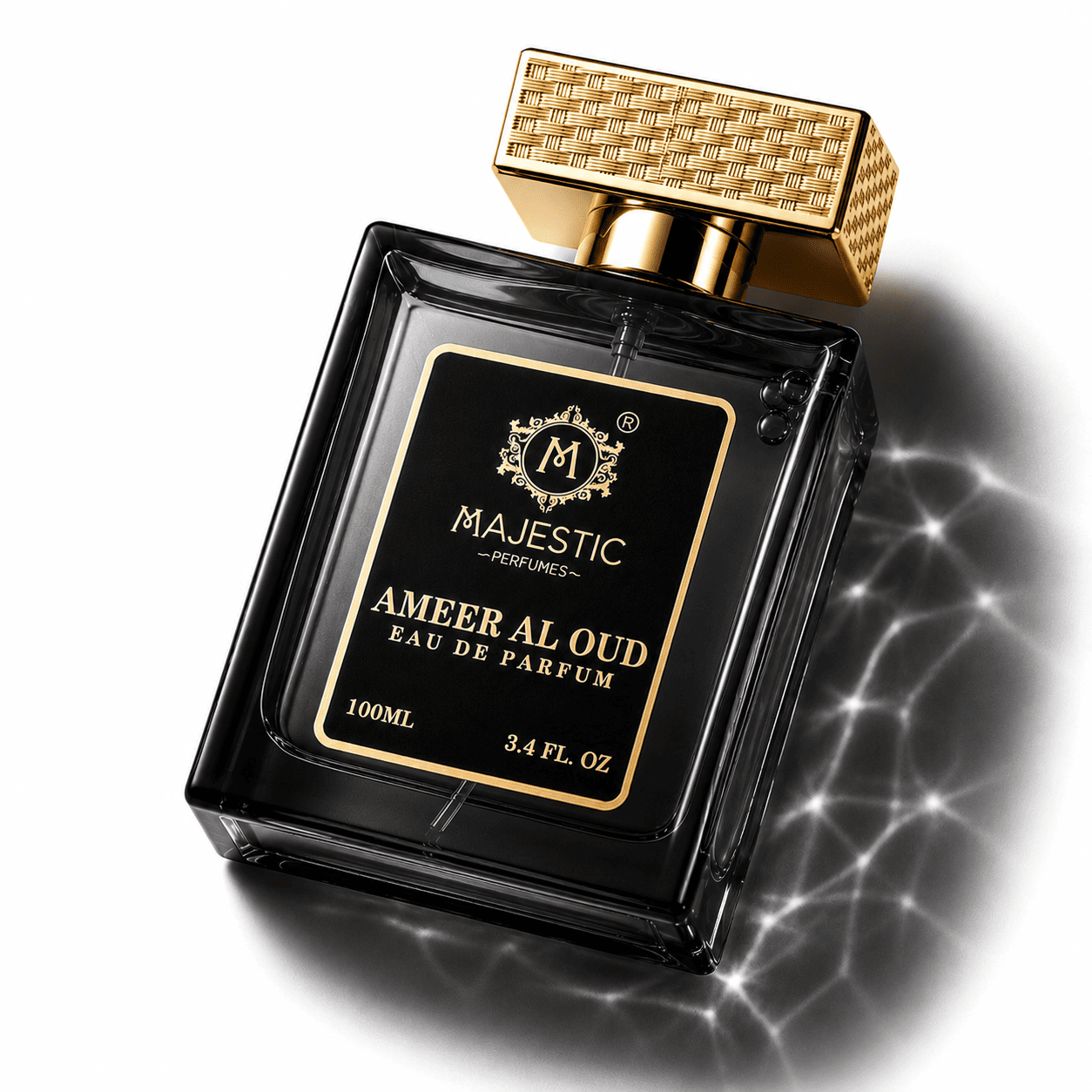 Majestic Perfumes India Ameer Al Oud 100ml perfume bottle with ornate design and gold accents on a neutral background.
