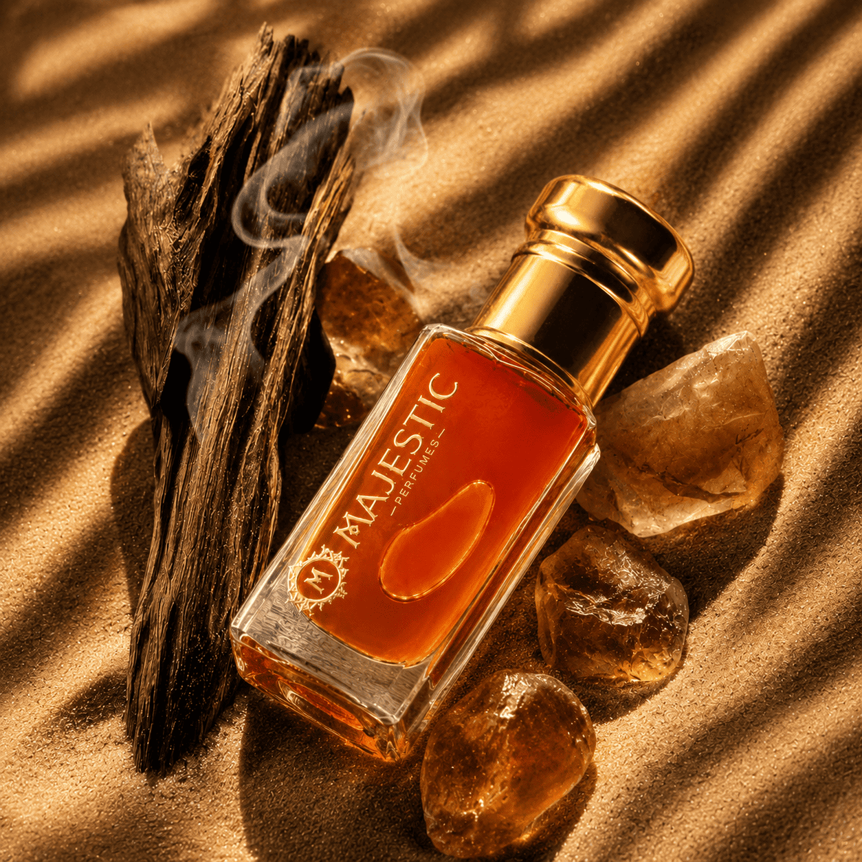 Majestic Perfumes India Ombre Nomade 12ml perfume bottle with a sleek design and dark-colored cap on a white background.