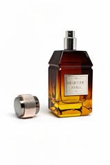 Majestic Aura Eau de Parfum bottle with a sleek design and a clear cap, displayed against a neutral background.